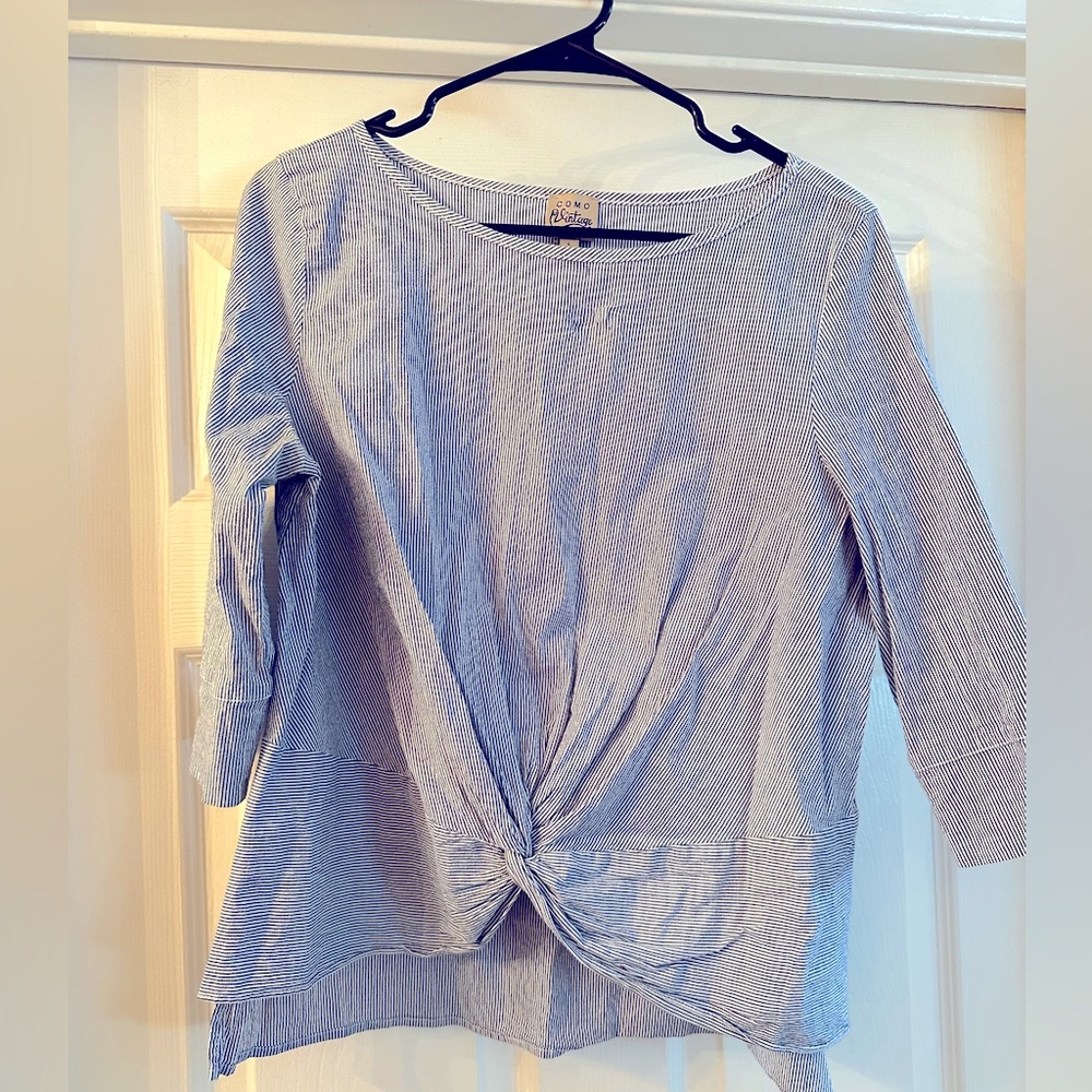 High-low twisted knot top